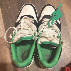 Black and White Sneakers with Green Accents